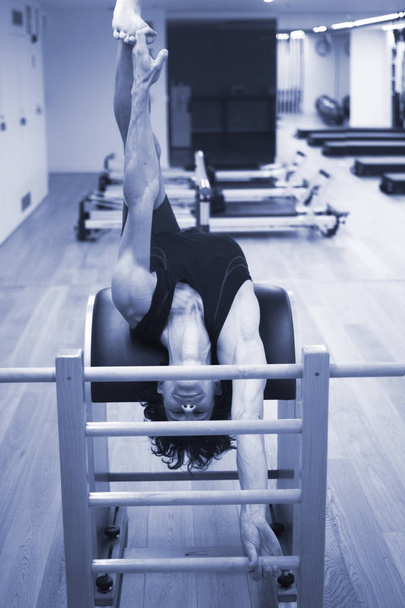 Man pilates teacher in gym - Photo, Image