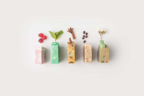 soap with different ingredients - Photo, Image