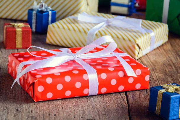 Gift Box Present and decorate on a wooden table  - Photo, image