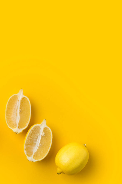 Two halves of lemon and single lemon - Photo, Image