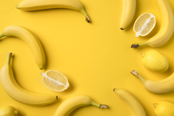 bananas and lemons halves - Photo, Image