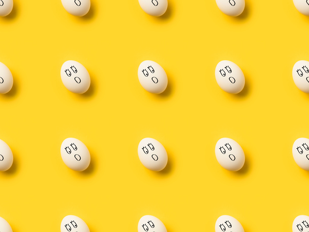 Painted chicken eggs with shocked emoji - Фото, зображення