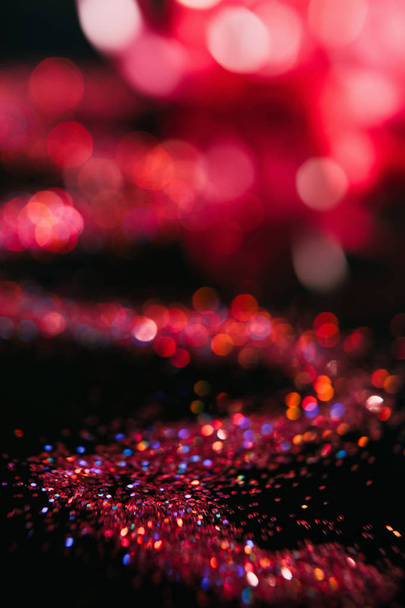 abstract red glitter defocused blur bokeh - Photo, image