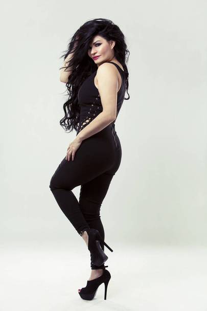 brunette wearing black bodysuit - Φωτογραφία, εικόνα