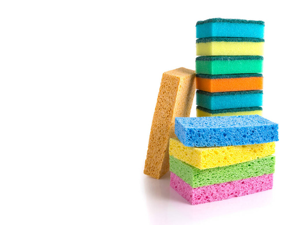 Stack of colorful cleaning sponges isolated on white background - Fotoğraf, Görsel