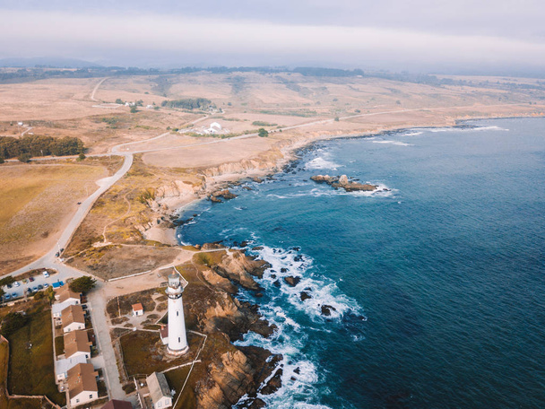 Amazing aerial view of the Pigeon Point lighthouse by the Pacific ocean near San Francisco and Santa Cruz cities   - Fotoğraf, Görsel