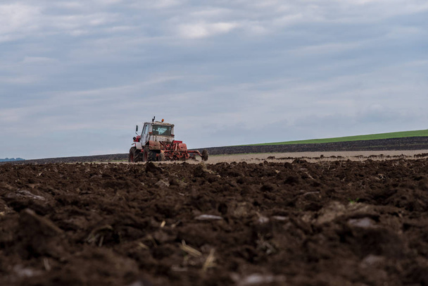 Tractor plowing fields. - Photo, Image