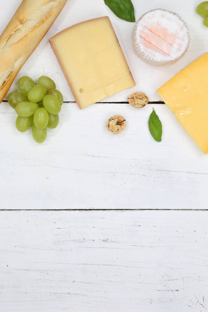Cheese board platter plate Swiss bread Camembert copyspace portr - 写真・画像