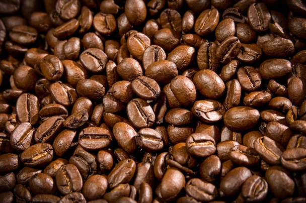 bruin koffiebonen voor achtergrond en textuur - Foto, afbeelding