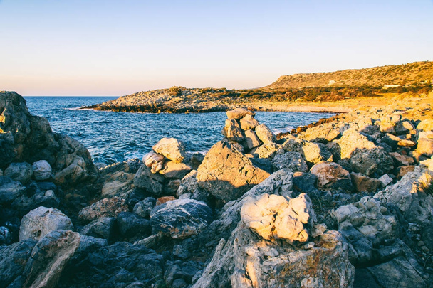 Hermosa puesta de sol en la costa de Creta
 - Foto, Imagen