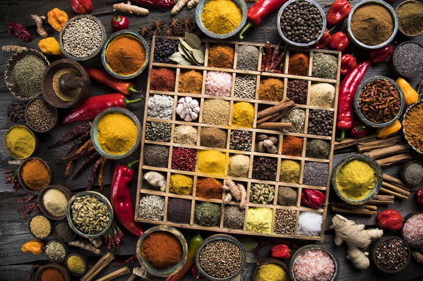 Assorted Spices in a wooden box - Photo, Image