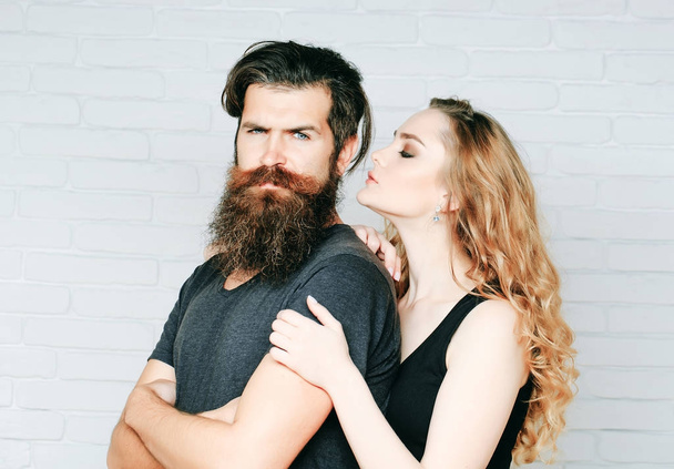 Girl and bearded hipster - Foto, imagen