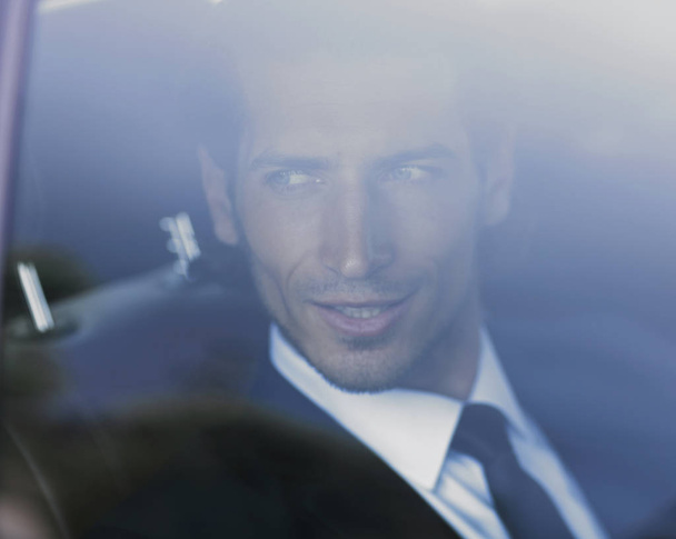 background image of the businessman in the car - Foto, Imagem