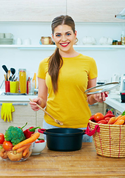 Young woman cooking food    - Фото, зображення