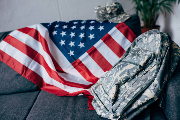 american flag and camouflage backpack - Fotó, kép