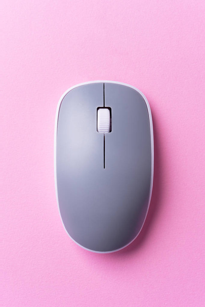 Wireless Gray computer mouse over pink background - Photo, Image