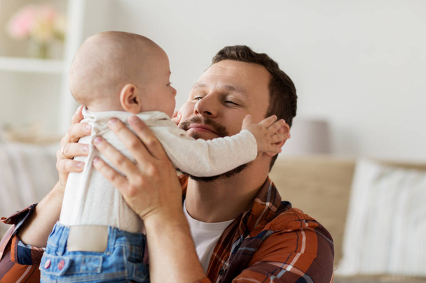 close up of father with little baby boy at home - Fotoğraf, Görsel