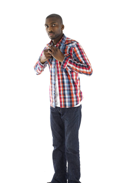 African male unbuttoning his checkered shirt - Φωτογραφία, εικόνα