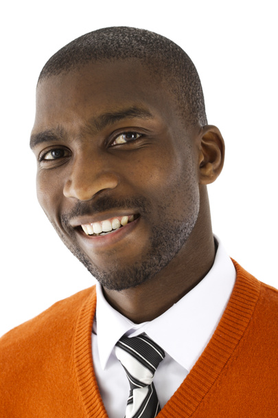 Portrait of a smiling African male businessman in a studio weari - Foto, Bild