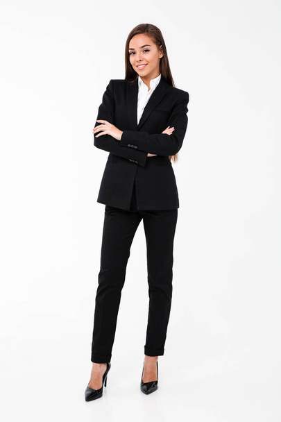 Business woman standing with arms crossed - Foto, afbeelding