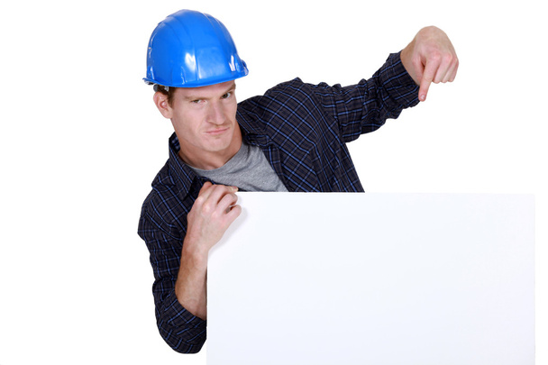 Confident builder promoting his business - Zdjęcie, obraz
