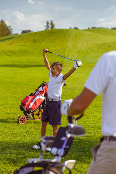 Boy practice golf - Fotó, kép