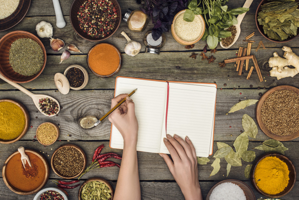 woman writing down recipe - Photo, Image