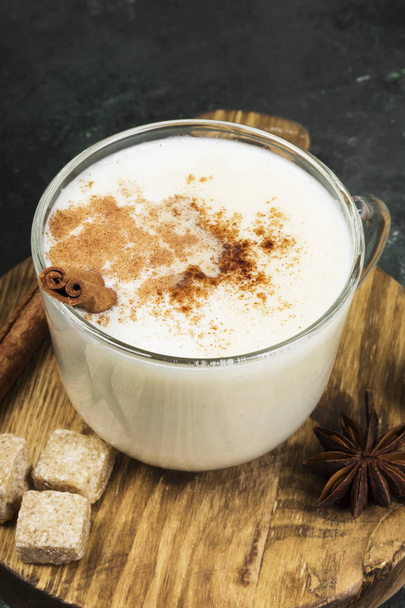 Christmas drink eggnog and ingredients on a green background - 写真・画像