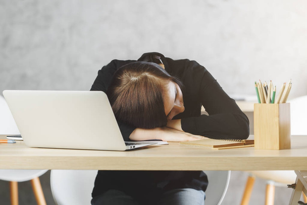 Sleeping woman at office desk  - Foto, imagen