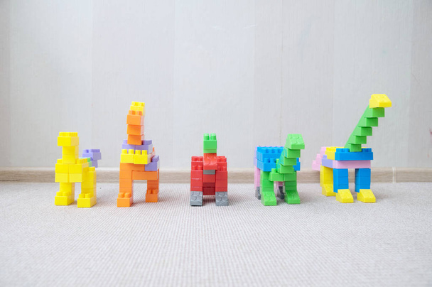 Dinosaur figurines made with plastic constructor block kit toys - Photo, Image