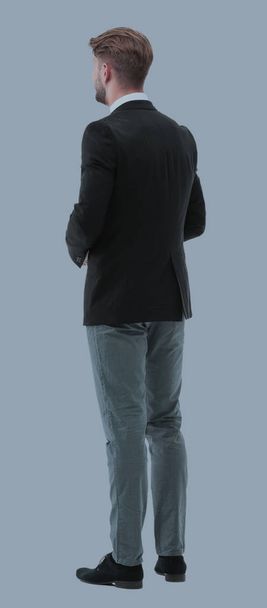 Businessman from the back - looking at something over a white ba - Fotoğraf, Görsel