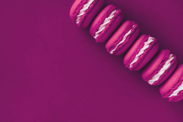 Macarons on same colored background - Foto, afbeelding