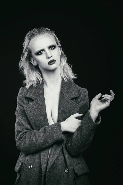stylish blonde in coat. fashion photo - Valokuva, kuva