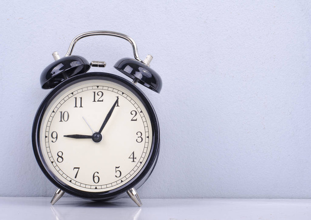 closeup  vintage alarm clock for time management concept - Foto, Bild