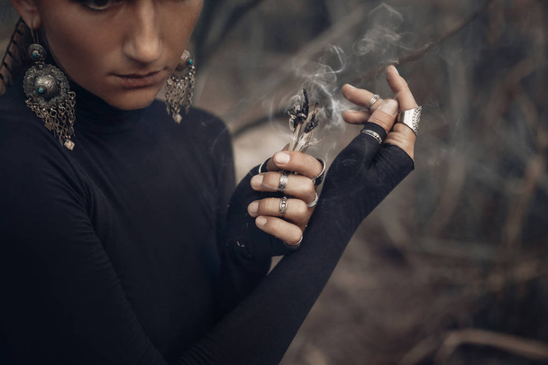 close up of young woman hands holding incense - Fotografie, Obrázek