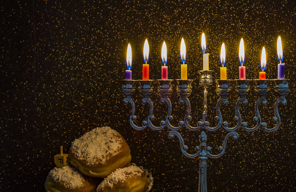 Image of the Hanukkah Jewish holiday with a menorah - Photo, Image