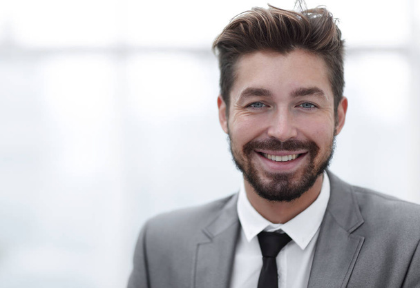 Happy young man in suit looking at camera with toothy smile - Foto, Imagem