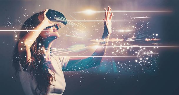 Digital Screen with young woman with VR - Φωτογραφία, εικόνα