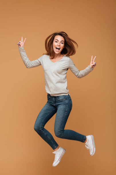 Screaming happy caucasian woman jumping - Foto, immagini