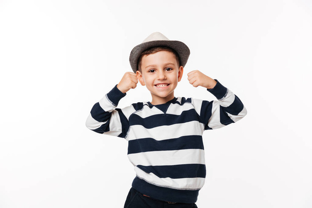 Portrait of a cheery cute little kid in a hat - Foto, afbeelding