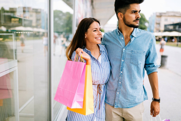  loving couple enjoy shopping together - Фото, зображення