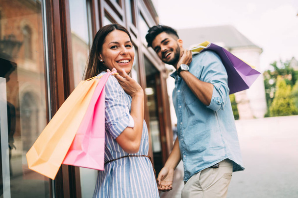  loving couple enjoy shopping together - Фото, изображение
