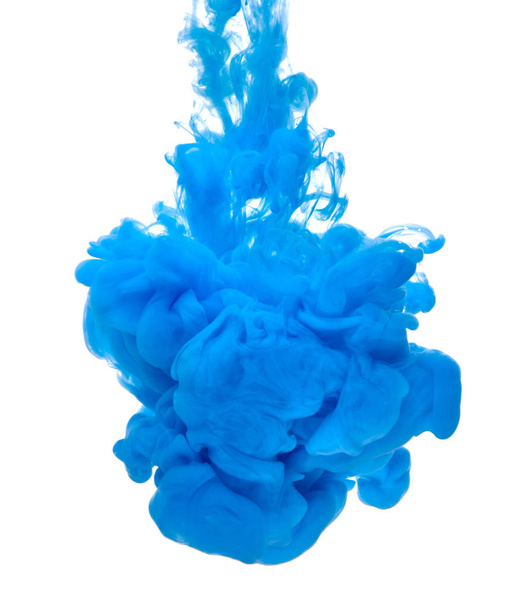 blue color paint pouring in water - Foto, Imagen
