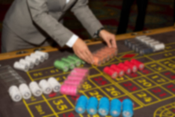 Αφηρημένη θολή ρουλέτα στο καζίνο - τυχερά παιχνίδια φόντο - Φωτογραφία, εικόνα