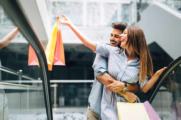  loving couple enjoy shopping together - Foto, Bild