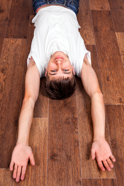 Young Man on the Floor - Foto, imagen