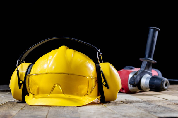 Safety accessories and impact hammer. Accessories for a builder  - 写真・画像