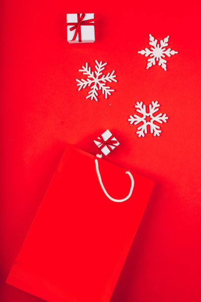 Festive Christmas attributes and decorations on a red background - Фото, изображение