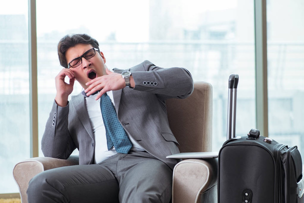 Young businessman in airport business lounge waiting for flight - Photo, image