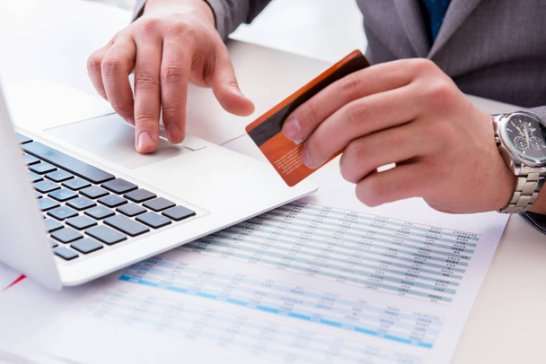 Male businessman doing online shopping with credit card - Фото, зображення